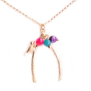 collier oiseau sur branche